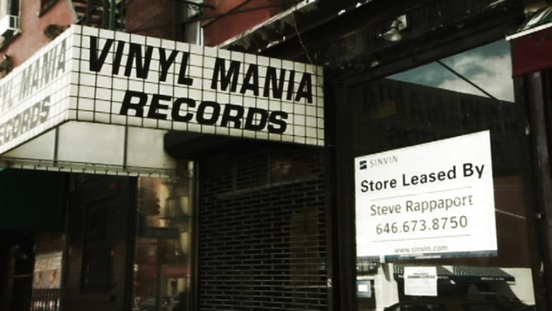 I Need That Record! background